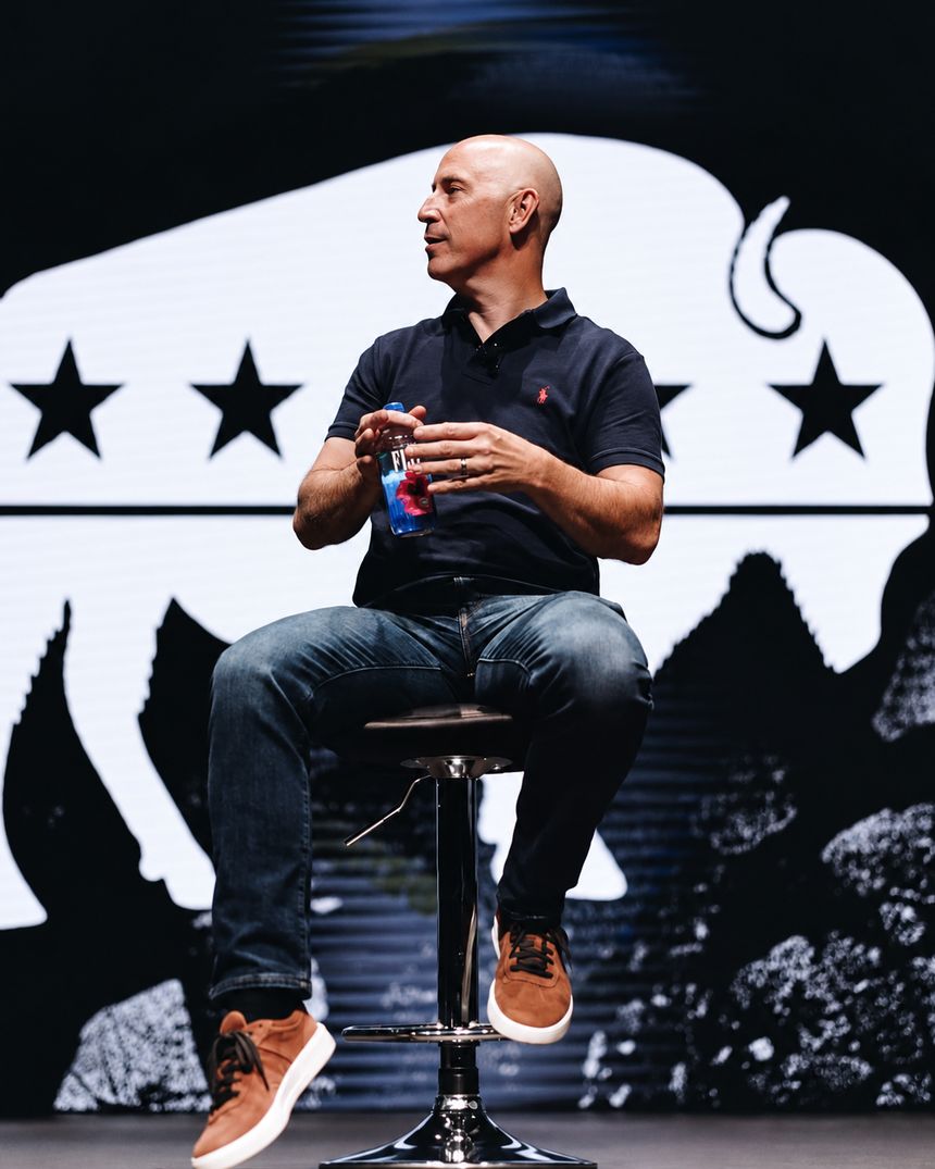 Vaughn Kohler speaking on stage