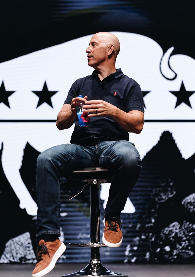 Vaughn Kohler speaking on stage